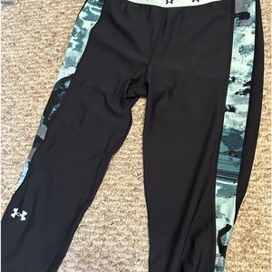 Under armor capris with blue strips down each side